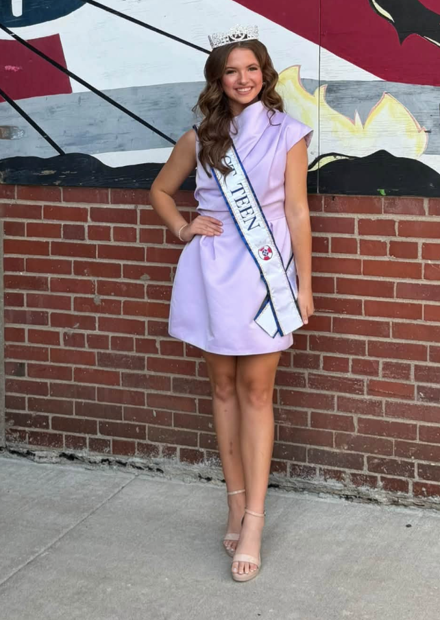 Miss ICT Teen titleholder wearing her crown and sash